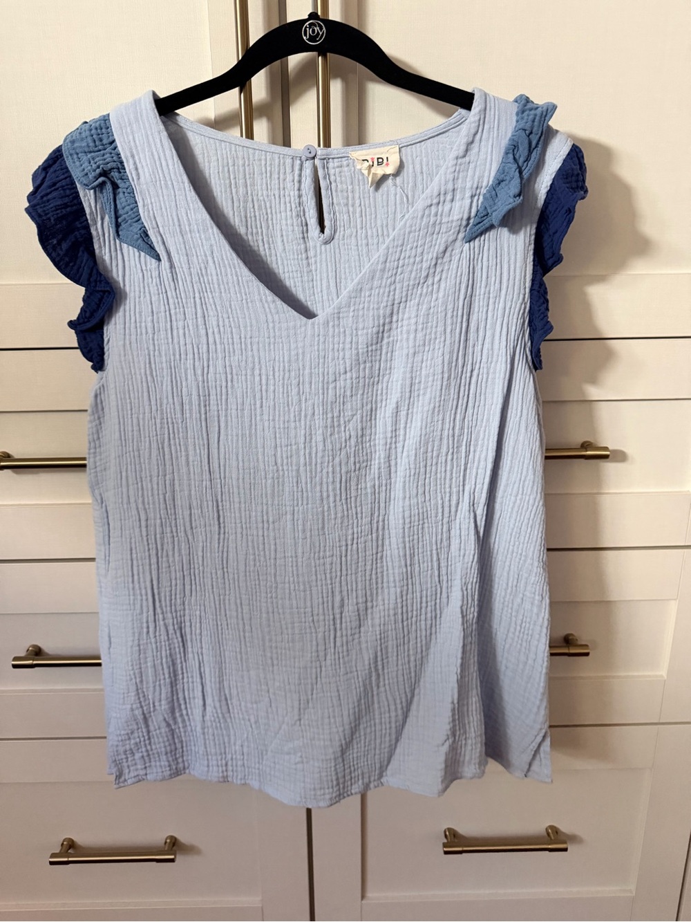 Sz L like New  BiBi light blue ruffle gauze blouse